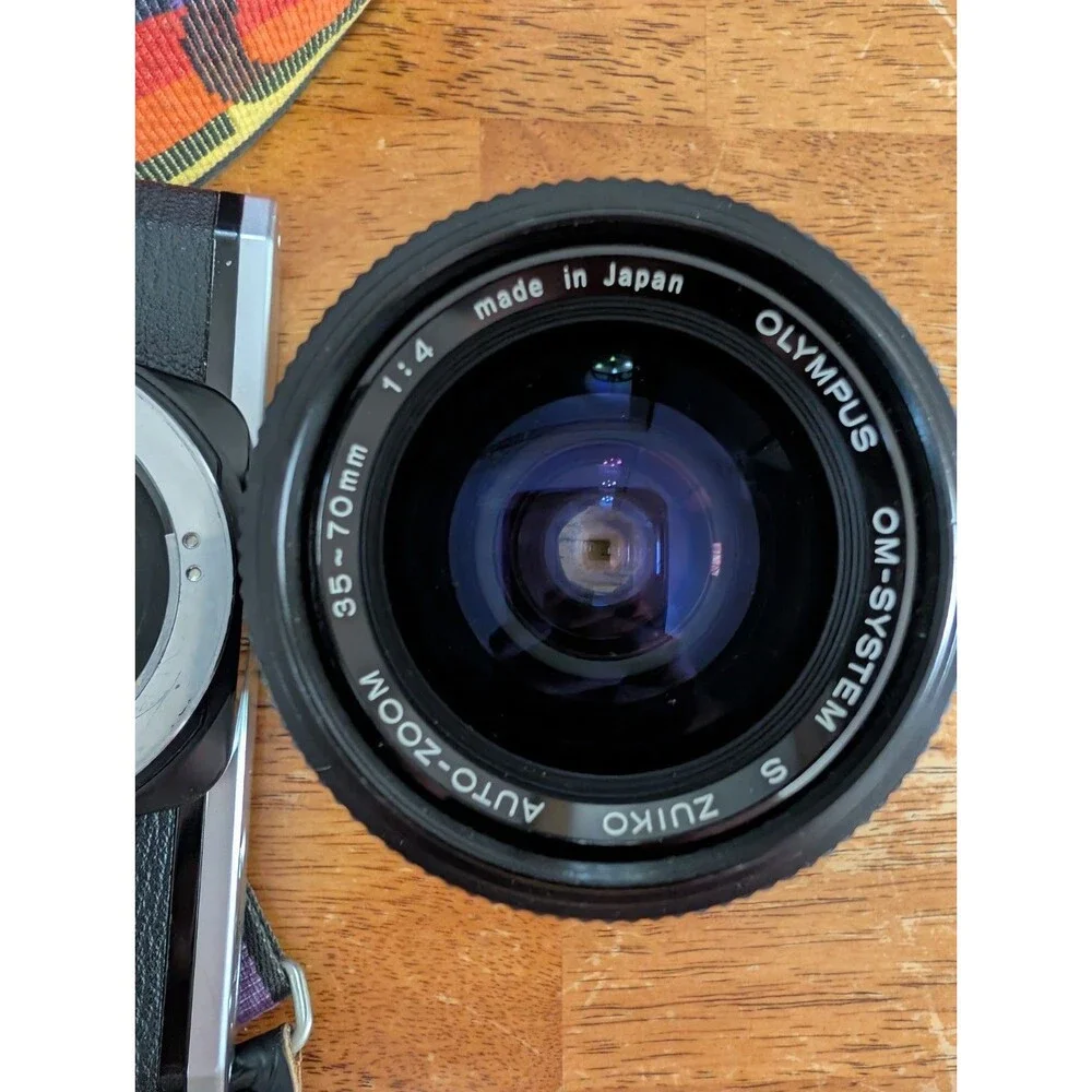 Vintage Olympus OM-10 Film Camera & 3-Lens Kit Bundle with Disney EPCOT Strap